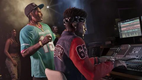 Dre’Quan Priest debout près d’une console de mixage où travaille un ingénieur du son, visuel officiel Rockstar Games