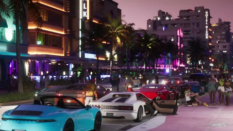 Des voitures de sport sous les néons d’Ocean Beach, la nuit, photogramme du Trailer 1 (0:33)