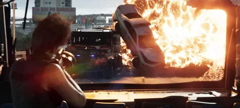 Véhicule blindé de la police dans une rue, Trailer 2 de GTA VI, visuel officiel Rockstar Games