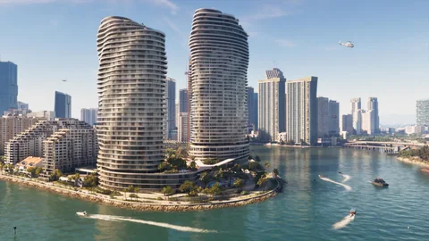 Deux tours ondulées dominent la baie de Vice City et ses bateaux, capture officielle Rockstar Games